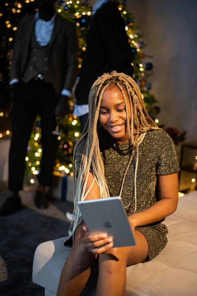 Client booking a braiding appointment online at Zealous Braids